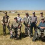 Group of hunters posing for a photo