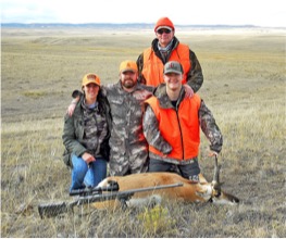 The team photo; (standing) Mike Filler, (front row, left to right) Kristin Morin, Nick Filler, and Stetson Bardfield.